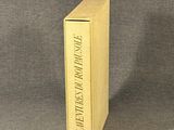 a yellow book that is sitting on a table