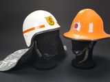 two helmets that are sitting next to each other