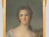 portrait of a woman in a white dress with a gold frame