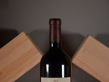 a bottle of wine that is sitting on a table