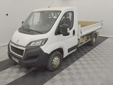 a white truck that is parked in a room