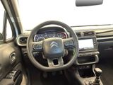 the interior of a car with a steering wheel, dashboard, and dash board