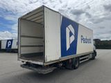 a picture of a delivery truck parked in a parking lot