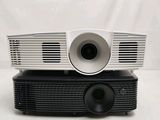 a close up of a projector sitting on top of a table