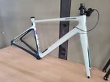 a bike that is sitting on a wooden table