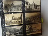 a picture of a display of old photos on the wall