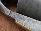 a close up of a pair of scissors on the floor
