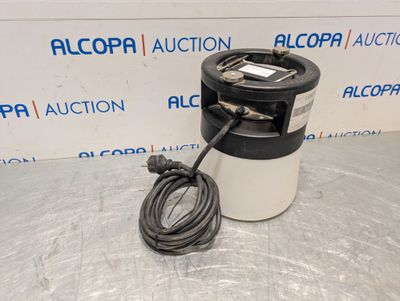 a black and white bucket with a cord connected to it