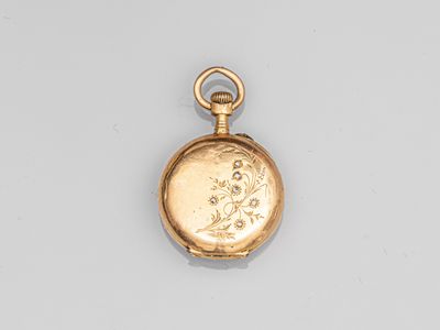 une montre de poche en or 18 carats dont le cadran représente une femme