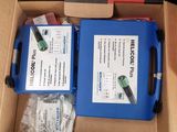 a box with two boxes of medical supplies inside of it