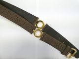 brown leather belt with gold buckles on a white background