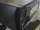 an image of a black computer case on top of a desk