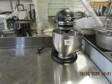 an image of a kitchen with a mixer on the counter
