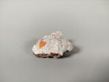 a small piece of food that is sitting on a table
