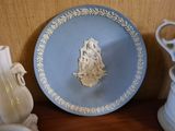 a blue plate with a picture of a dog on it