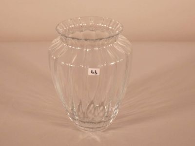 a glass vase that is sitting on a table