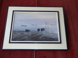 framed picture of a painting of a beach scene with boats in the water