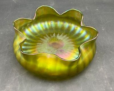 a glass bowl that is sitting on a table