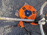 a close up view of a bicycle wheel with a tool on it