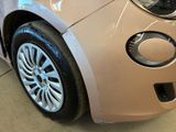 a close up of a car that is in a showroom