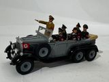 a toy car with a group of people in it