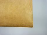 leather wallet on a table with a white background