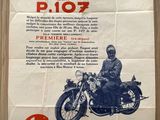 poster of a man riding a motorcycle on a wooden floor