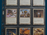 many cards of different colors and designs on a blue background