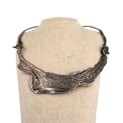 a close up of a necklace on a mannequin mannequin mannequin mannequin mannequin mannequin mannequin mannequin