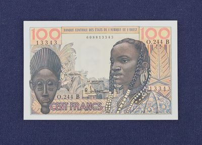 une image d'un billet de banque sur lequel figurent une femme et un homme