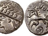 une pièce de monnaie en argent portant l'image d'un homme et d'une femme