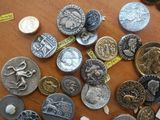 a lot of coins on a table with a tag on it