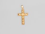 a gold cross pendant on a white background