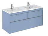 two sinks in a blue bathroom with a white counter top and two faucets