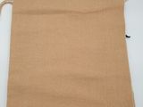 a bag of burlock cloth on a white table