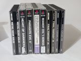 five cassettes stacked on top of each other on a table