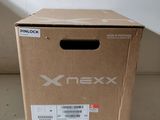 a box that is sitting on the floor next to a wall