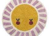 une photo d'un tapis sur lequel figure un smiley