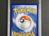 a close up of a pokemon card on a table