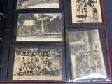 a black and white photo of a group of old photos in a binder