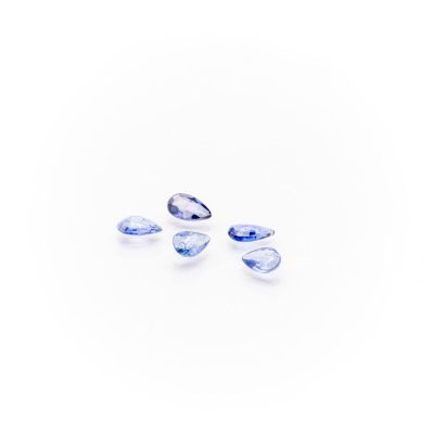 a group of three blue sapphires on a white background