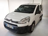 a white van that is parked in a garage