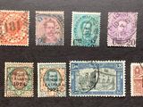 une image représentant un ensemble de timbres sur lesquels figurent différents visages