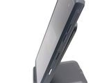 a cell phone that is sitting on top of a stand