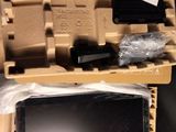 a box with a laptop inside of it sitting on a table