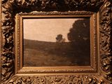 tableau représentant un paysage avec un arbre solitaire, dans un cadre doré