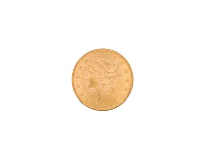 a close up of a gold coin on a white background