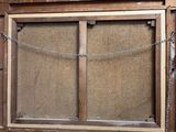 a picture of a window with a chain hanging from it