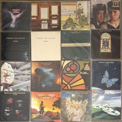 a lot of different album covers on the wall
