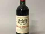 a bottle of wine that is sitting on a table